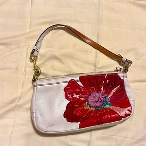 Coach leather mini bag with floral detail